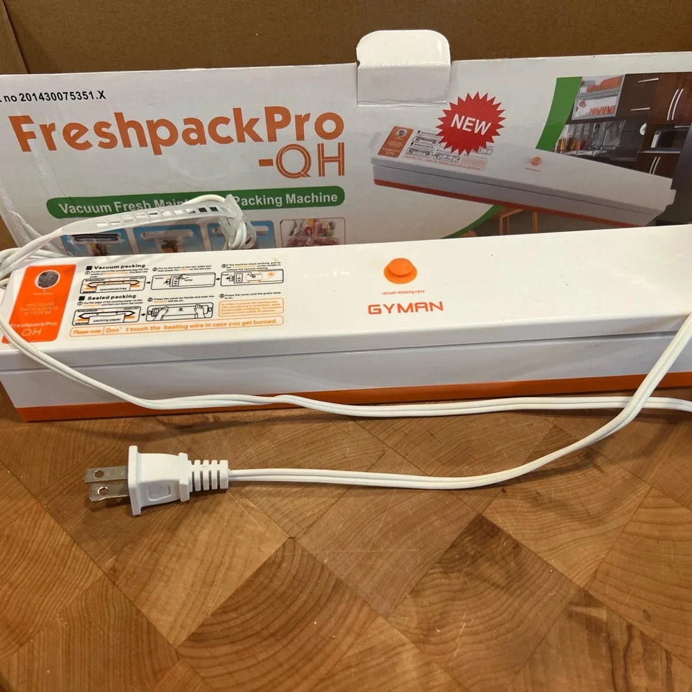 FreshpackPro QH Vacuum Sealer - White and Orange